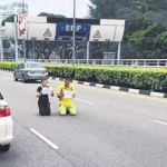 中国夫妻下跪请愿新加坡人力部,因行为鲁莽被逮捕