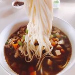 新加坡一碗臊子面背后的笑颜