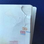 在海关时发现护照内页破损,被拒绝入境,我该怎么办?