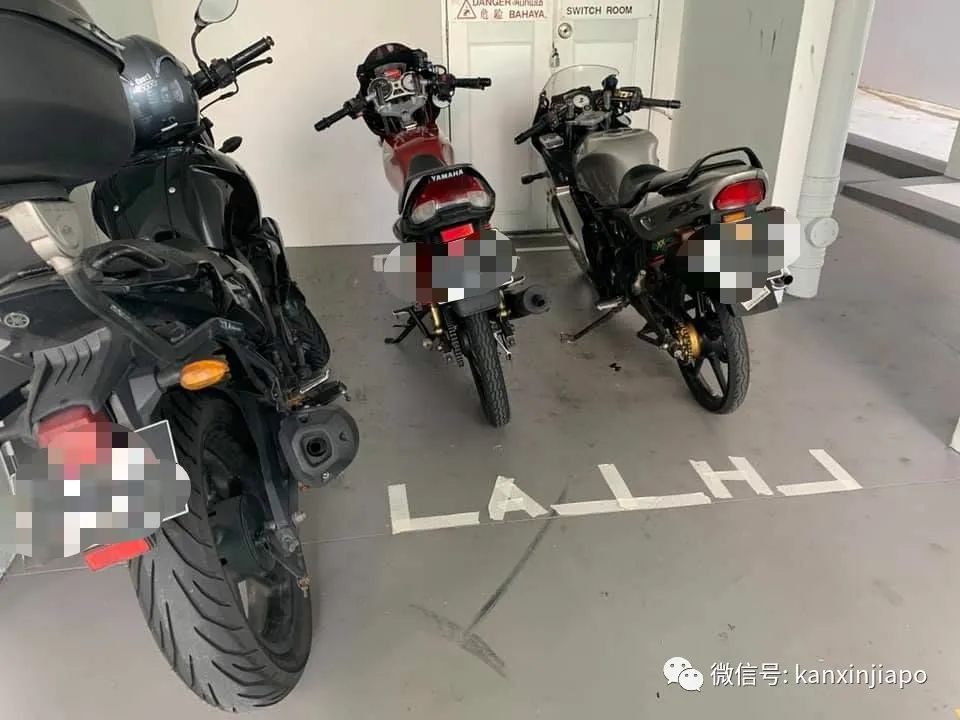 摩托車主在公共區域,用膠帶自制停車位