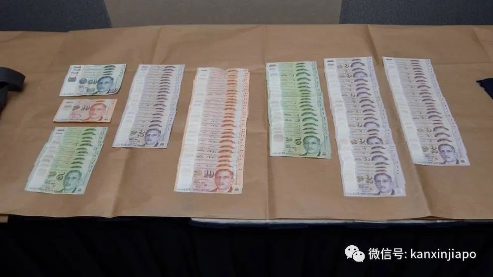 新加坡輔警光天化日之下,持槍打劫貸款公司