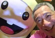 新加坡“顶流摄影师”营业!李显龙晒14张私房照邀粉丝互动,限定表情包上线